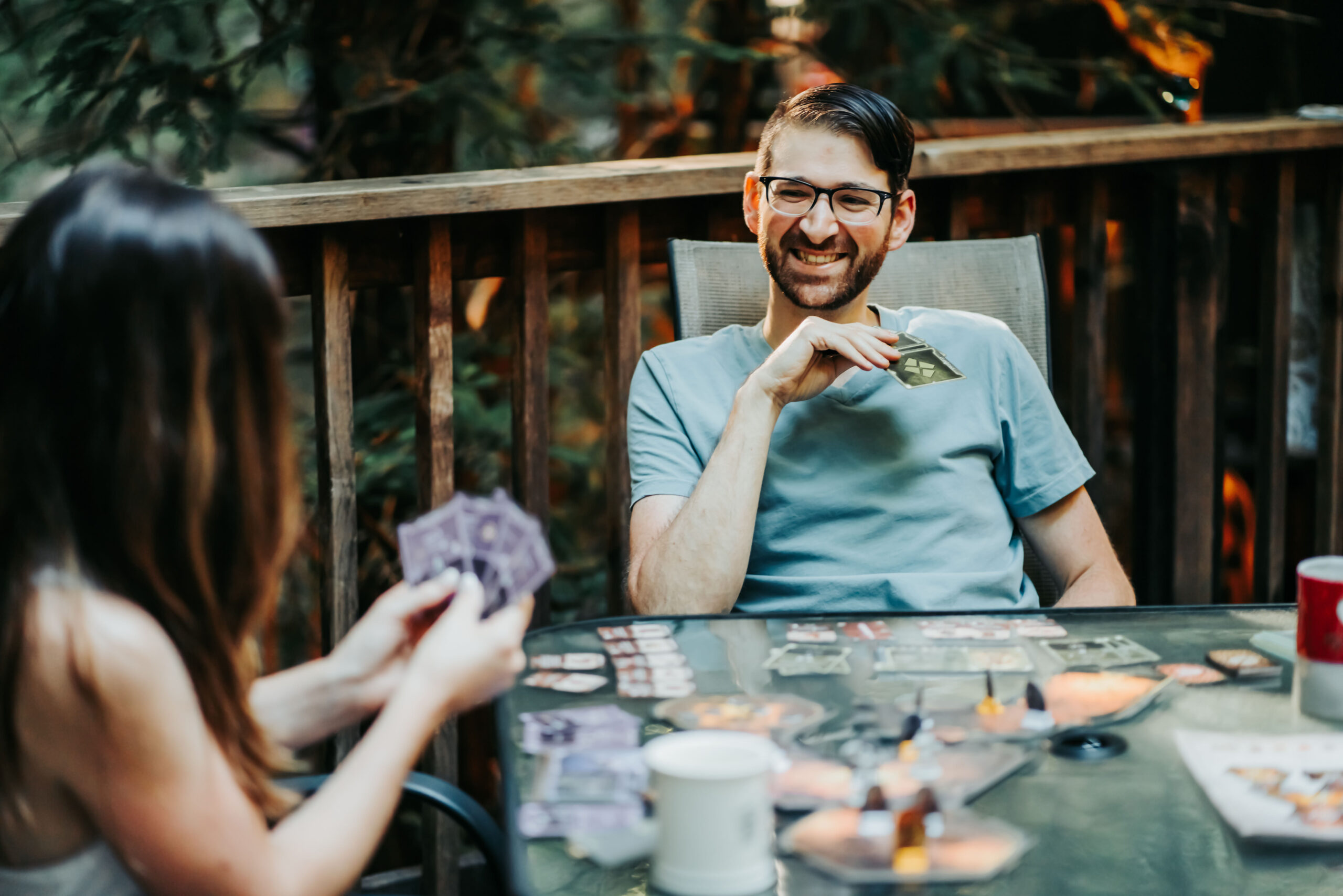 a guy playing a game with his new wife during their mini moon adventure in Northern California