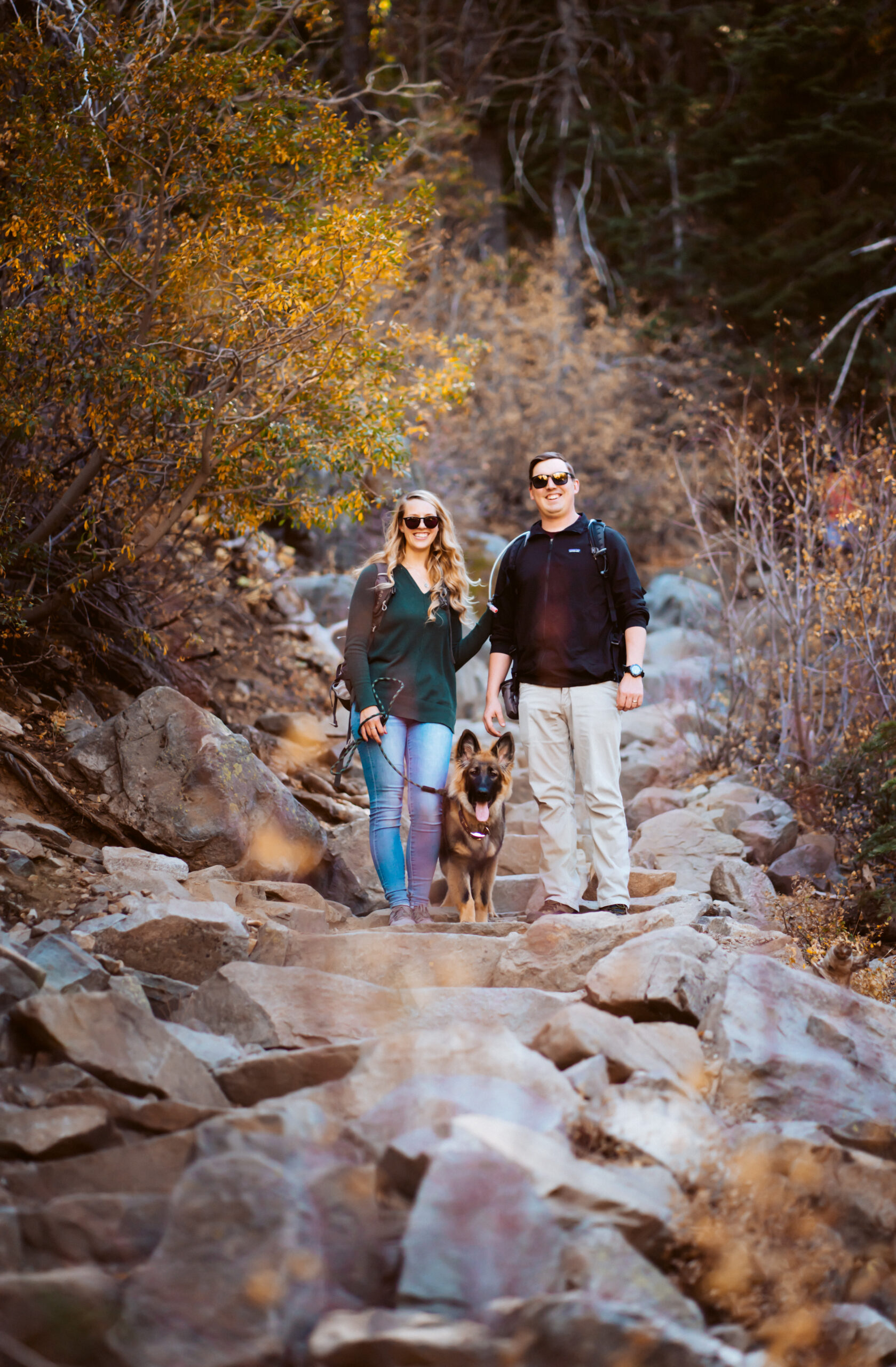 a couple on the stairs for their hike to their engagement photo session in Lake Tahoe