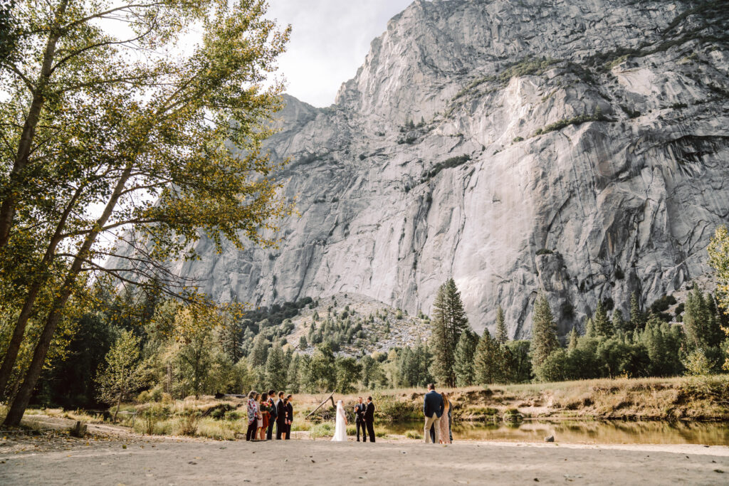 A wedding couple having an elopement ceremony in Yosemite Valley