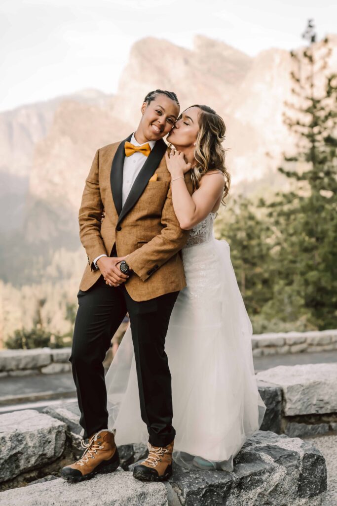 Two brides pose during their Yosemite National Park elopement
