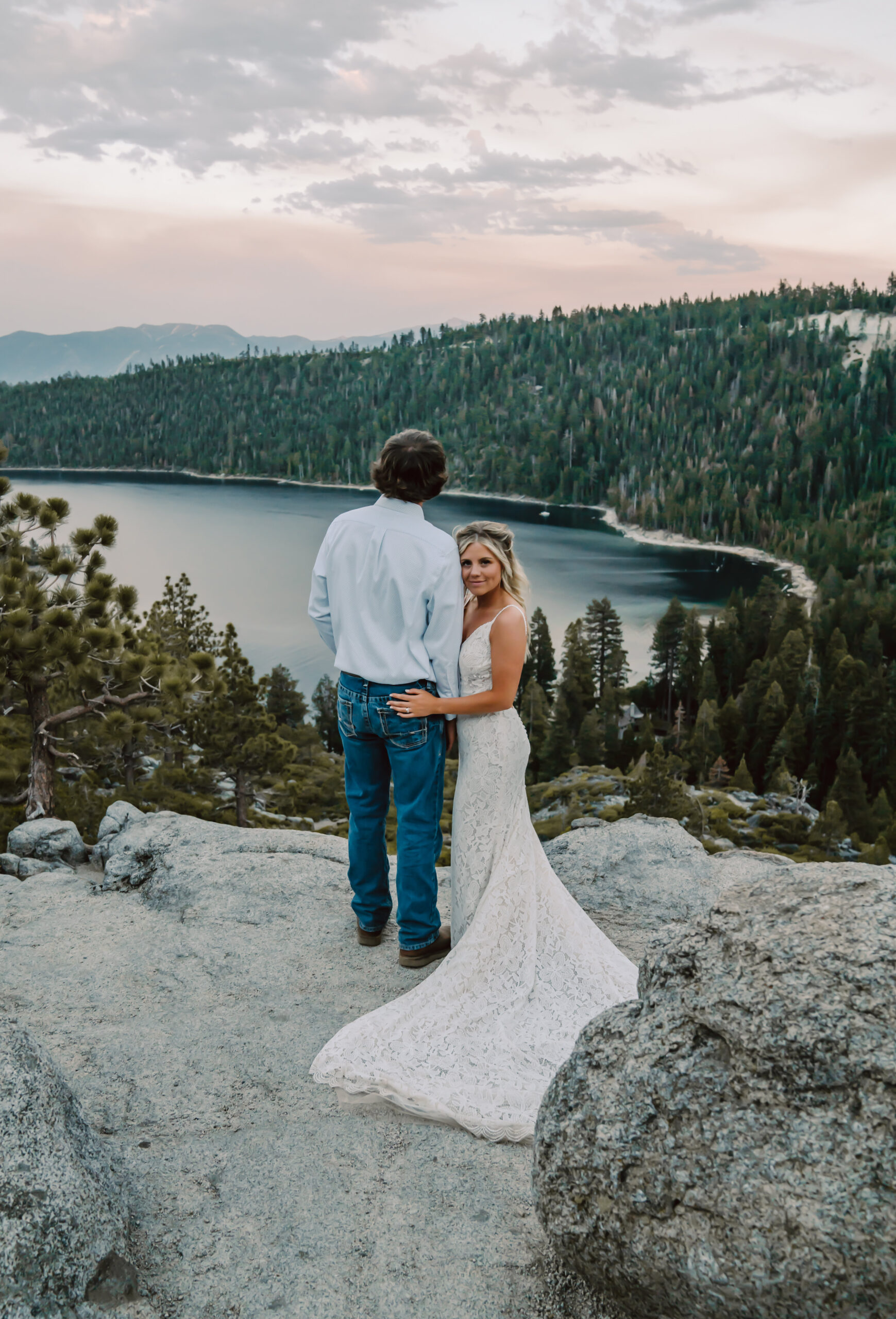 Emerald Bay elopement with the couple overlooking the sunset