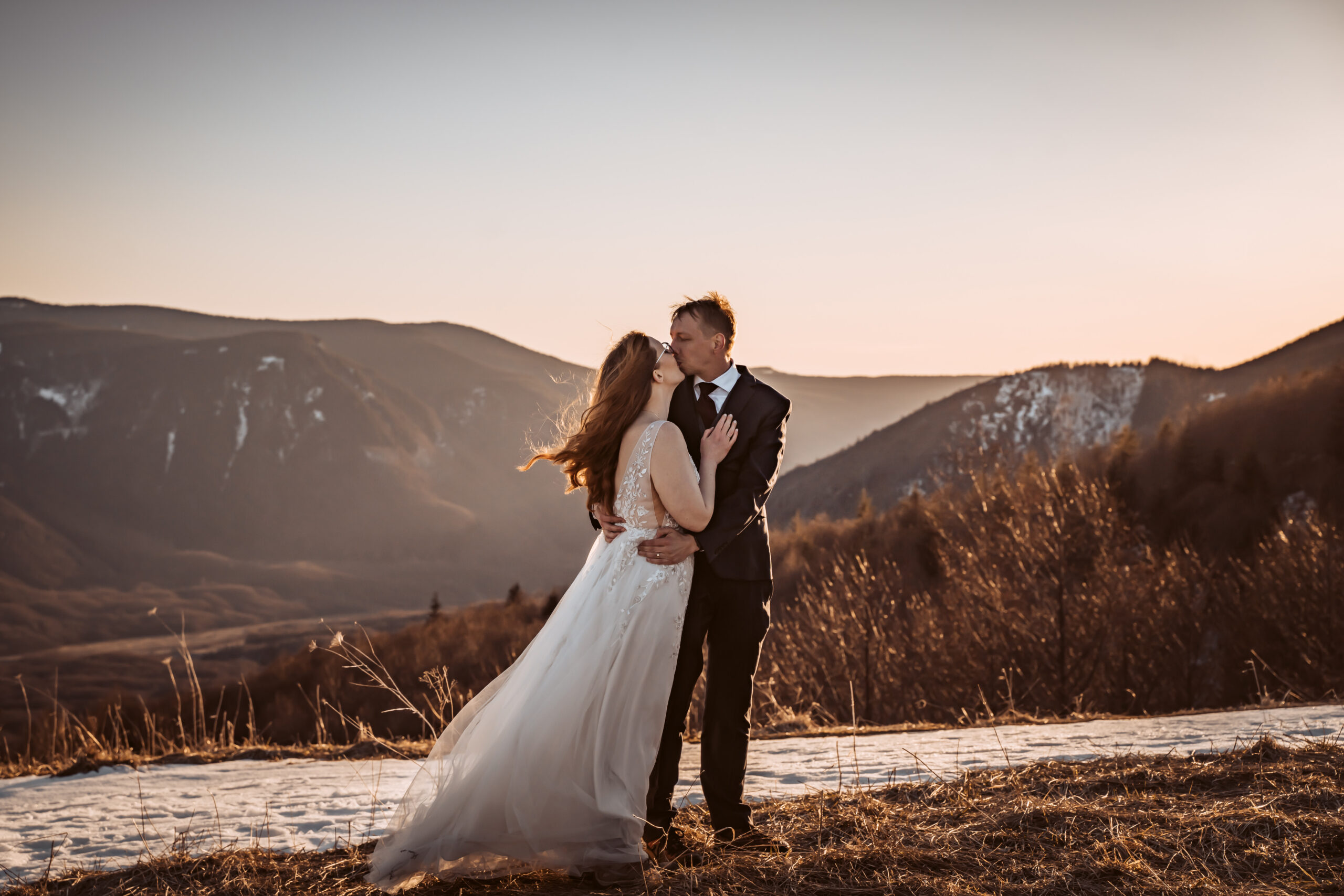 a couple kissing in the sunset for their elopement day in Mount Saint Helens
