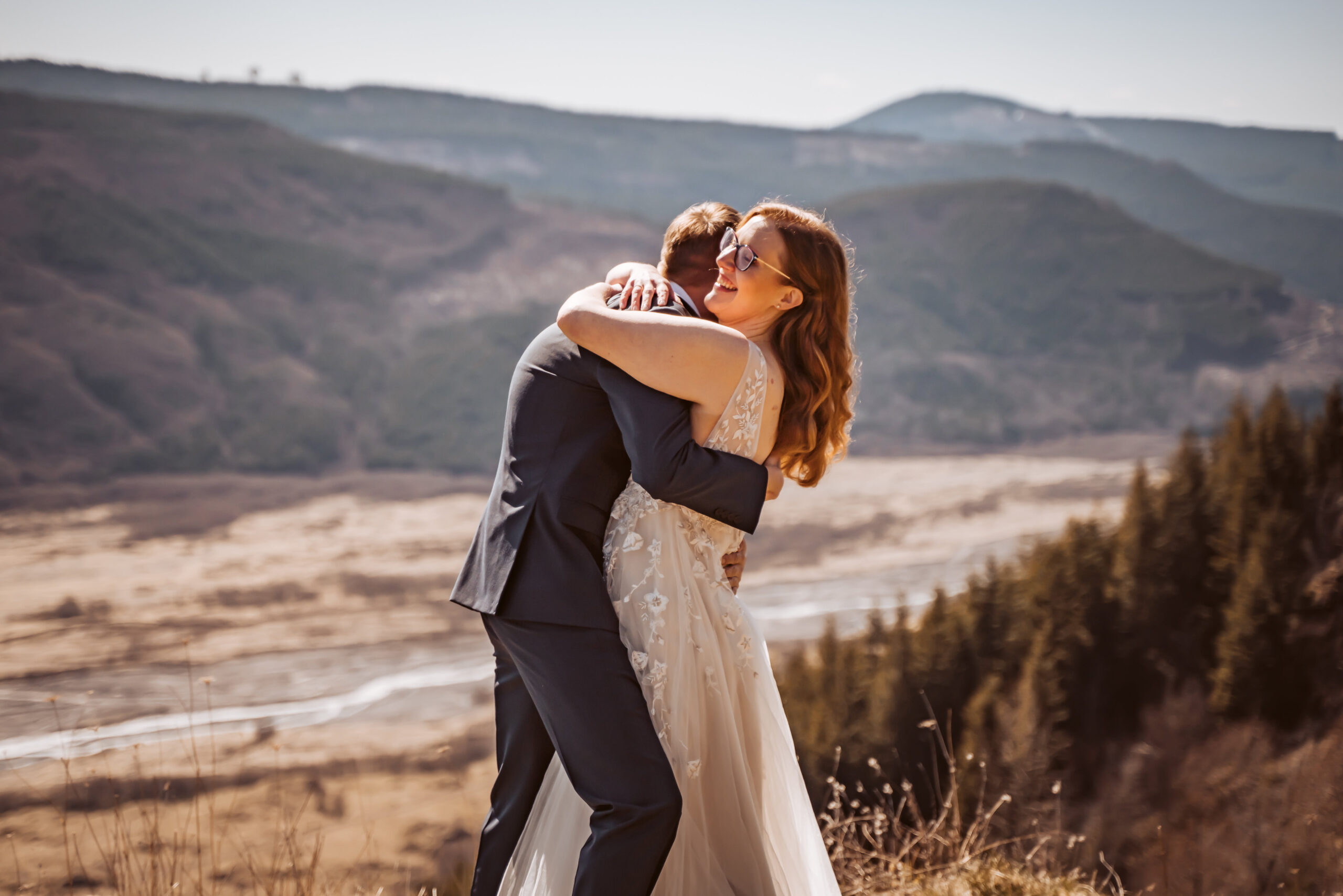 a couple hugging after their first look during their mount saint helens elopement