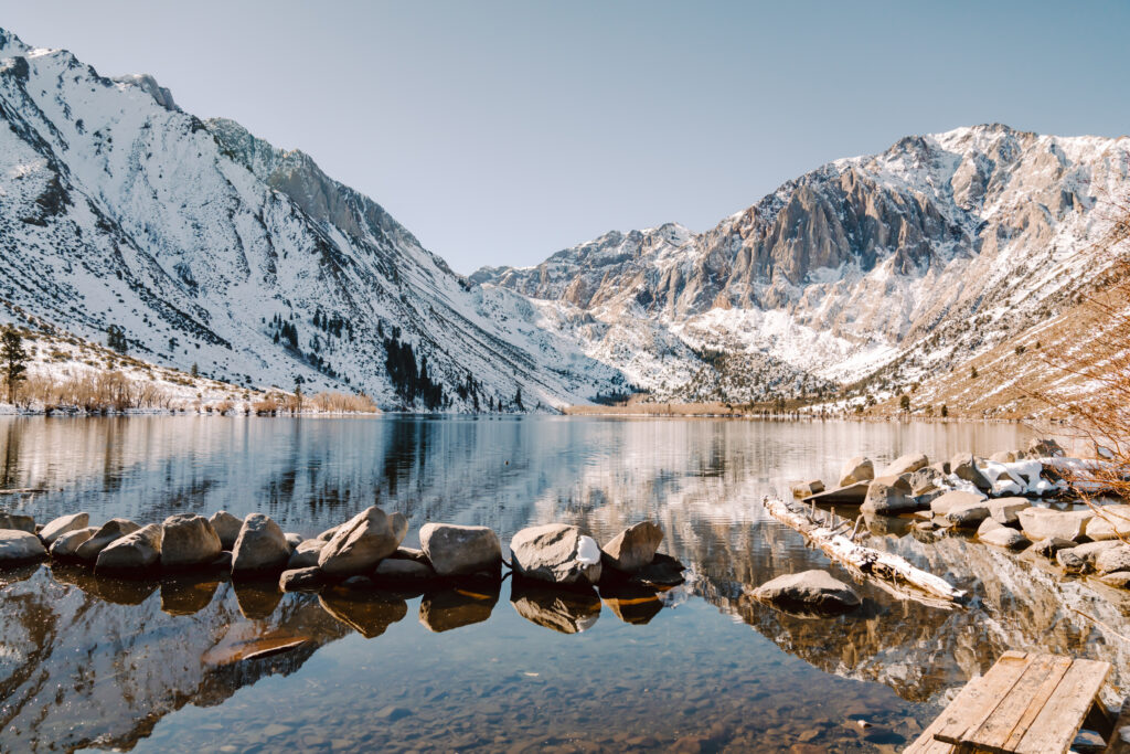 now capped mountains of convict lake in Mammoth Lake California