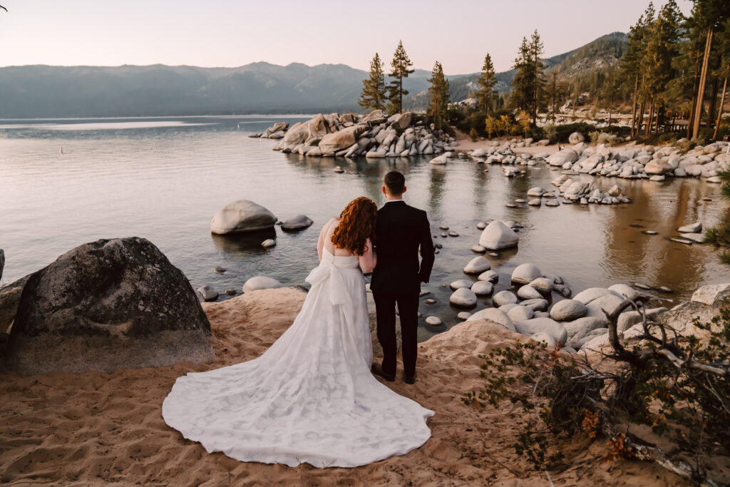 An elopement couple in Tahoe overlooking Sand Harbor during sunset
