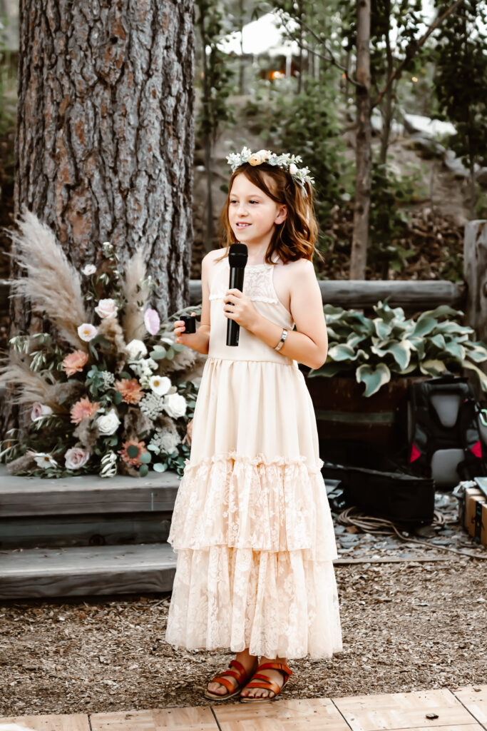 a daughter giving a toast at the wedding