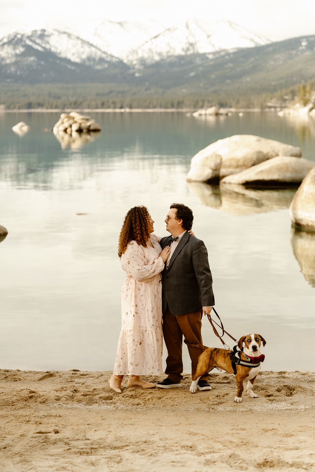 Man and woman with their dog at Sand Harbor