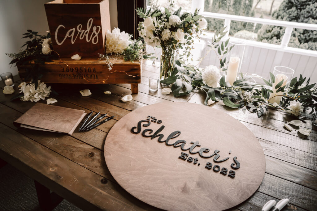 A sign in board for a wedding decoration