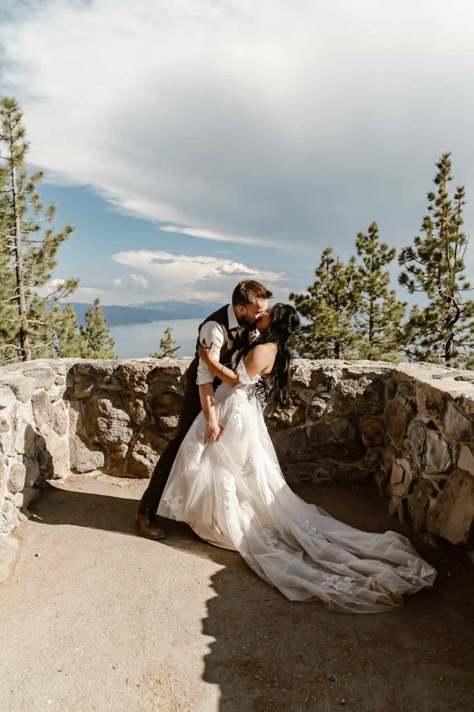 A wedding couple kissing at the Stateline Fire lookout for their Elopement in Lake Tahoe