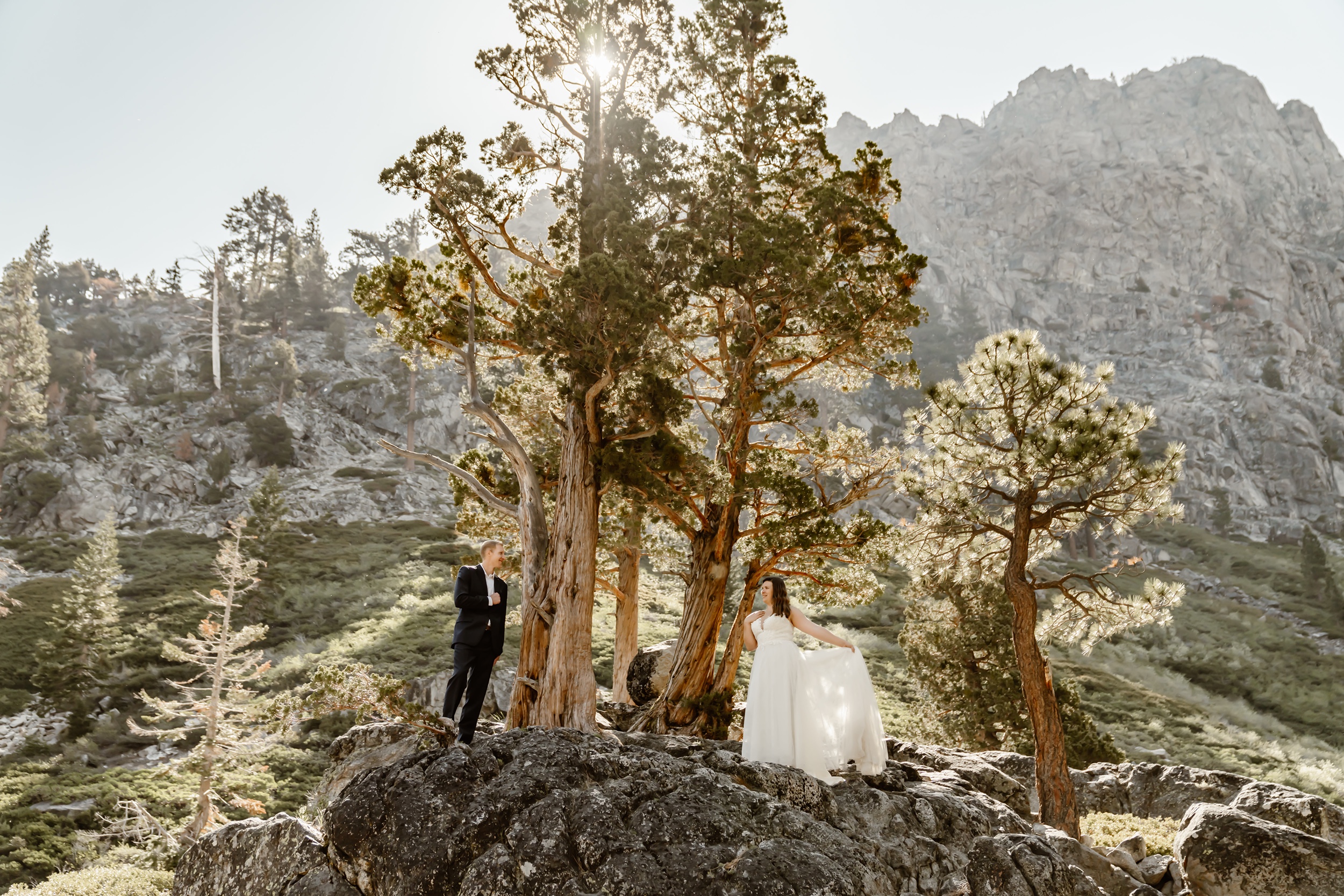 Couple poses with Lake Tahoe elopement backdrop