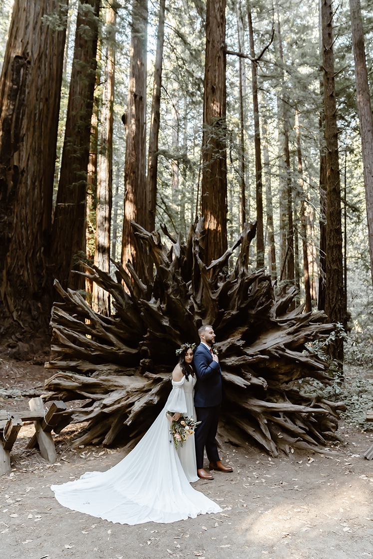 Couple poses at their Armstrong Redwood elopement