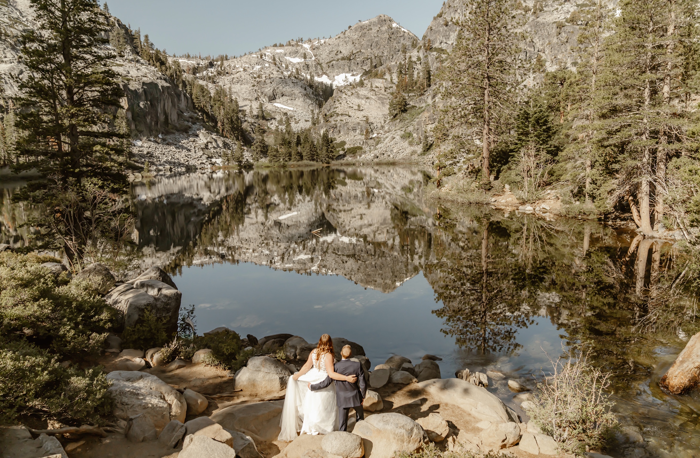 Bride and groom taking in the views at their Emerald Bay elopement
