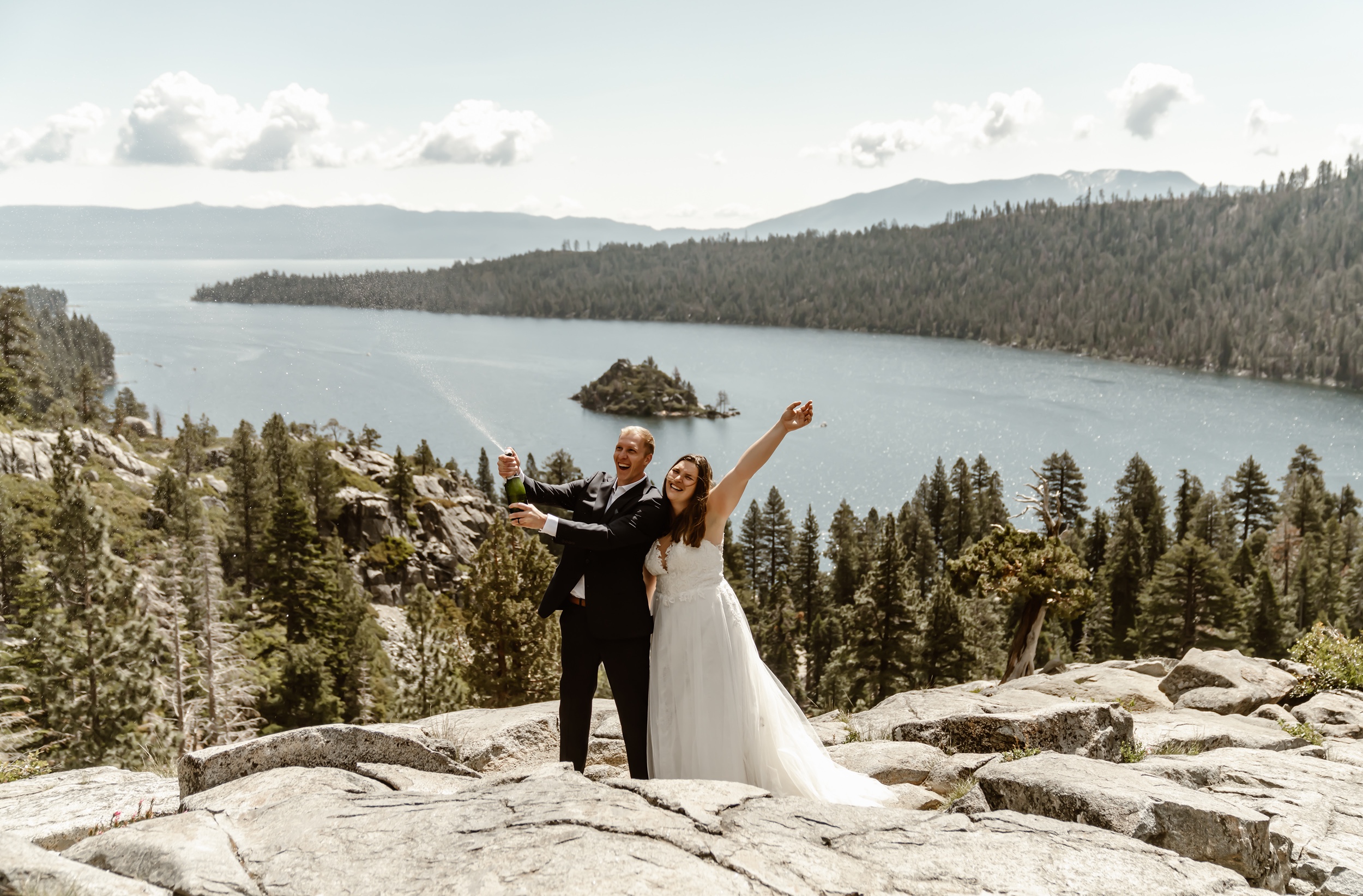Bride and groom pop champagne after Lake Tahoe elopement