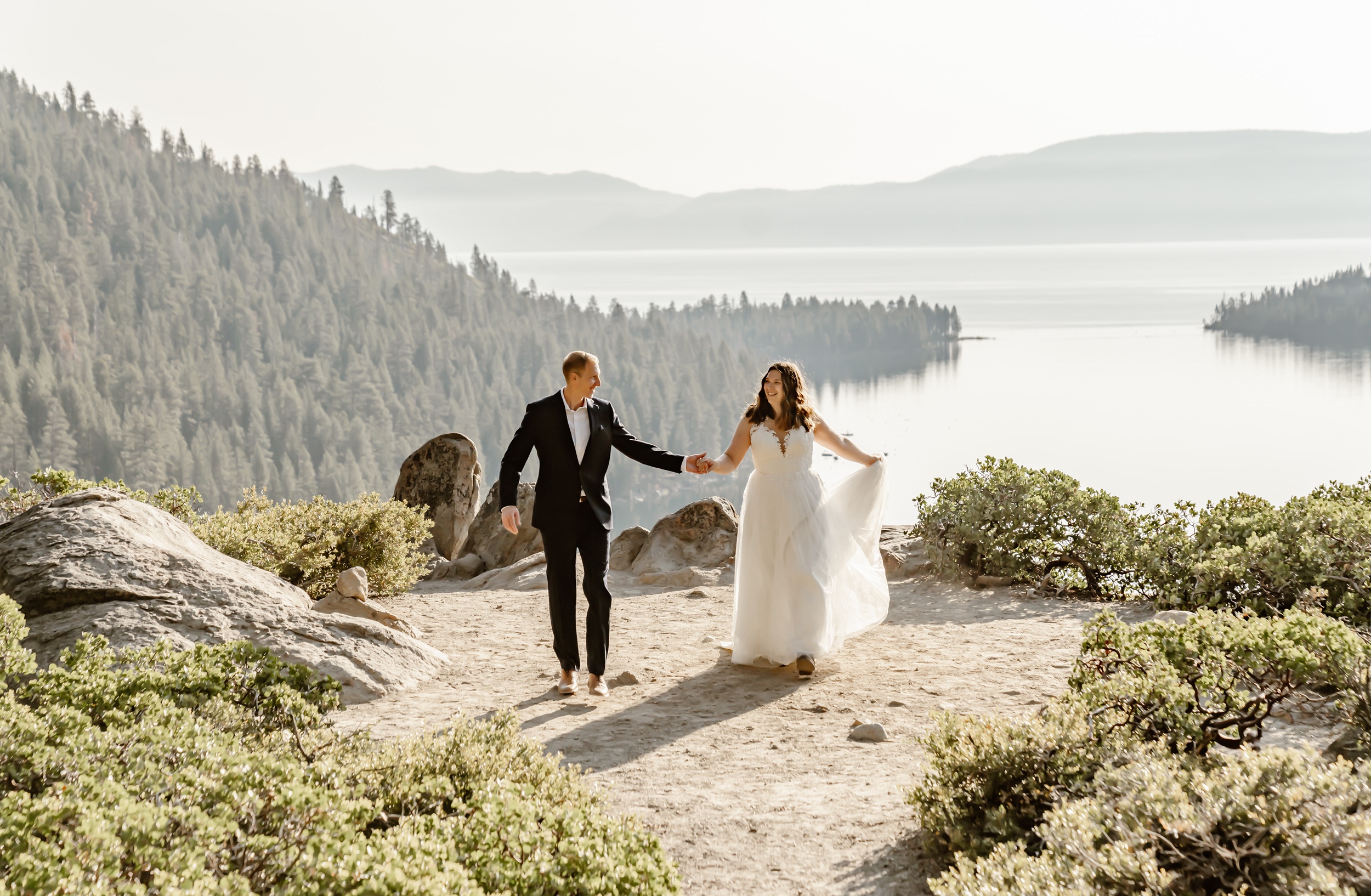 Bride and groom with Emerald Bay backdrop