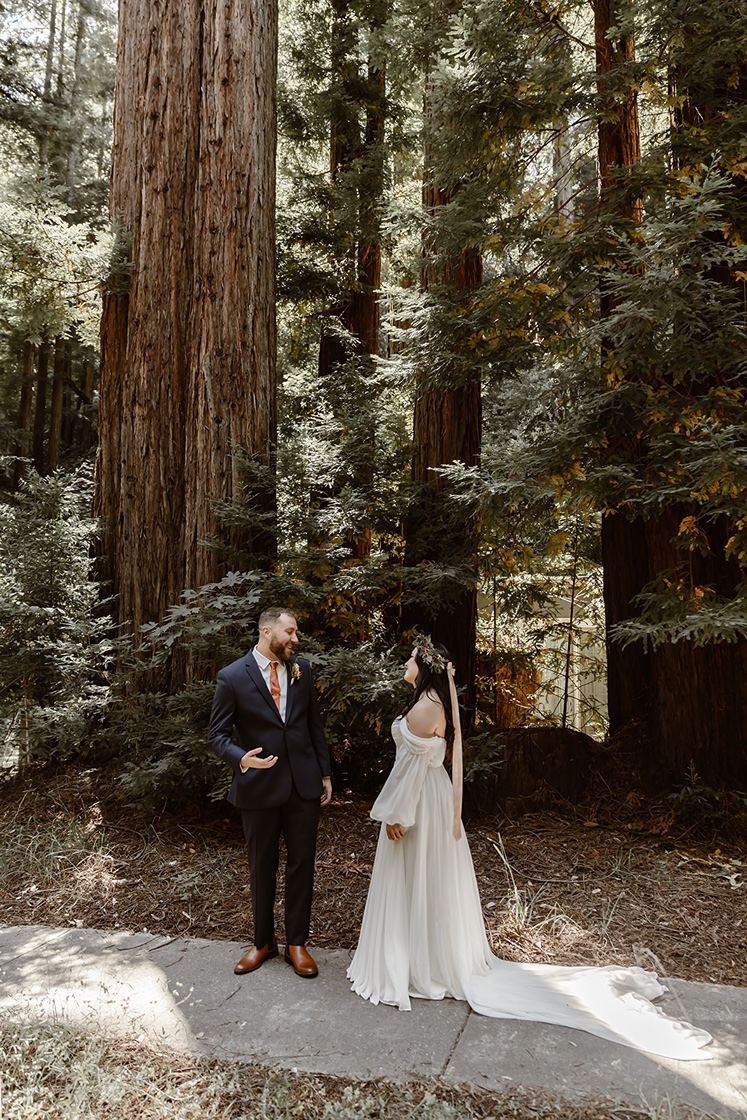 Bride and groom have first look at their forest elopement