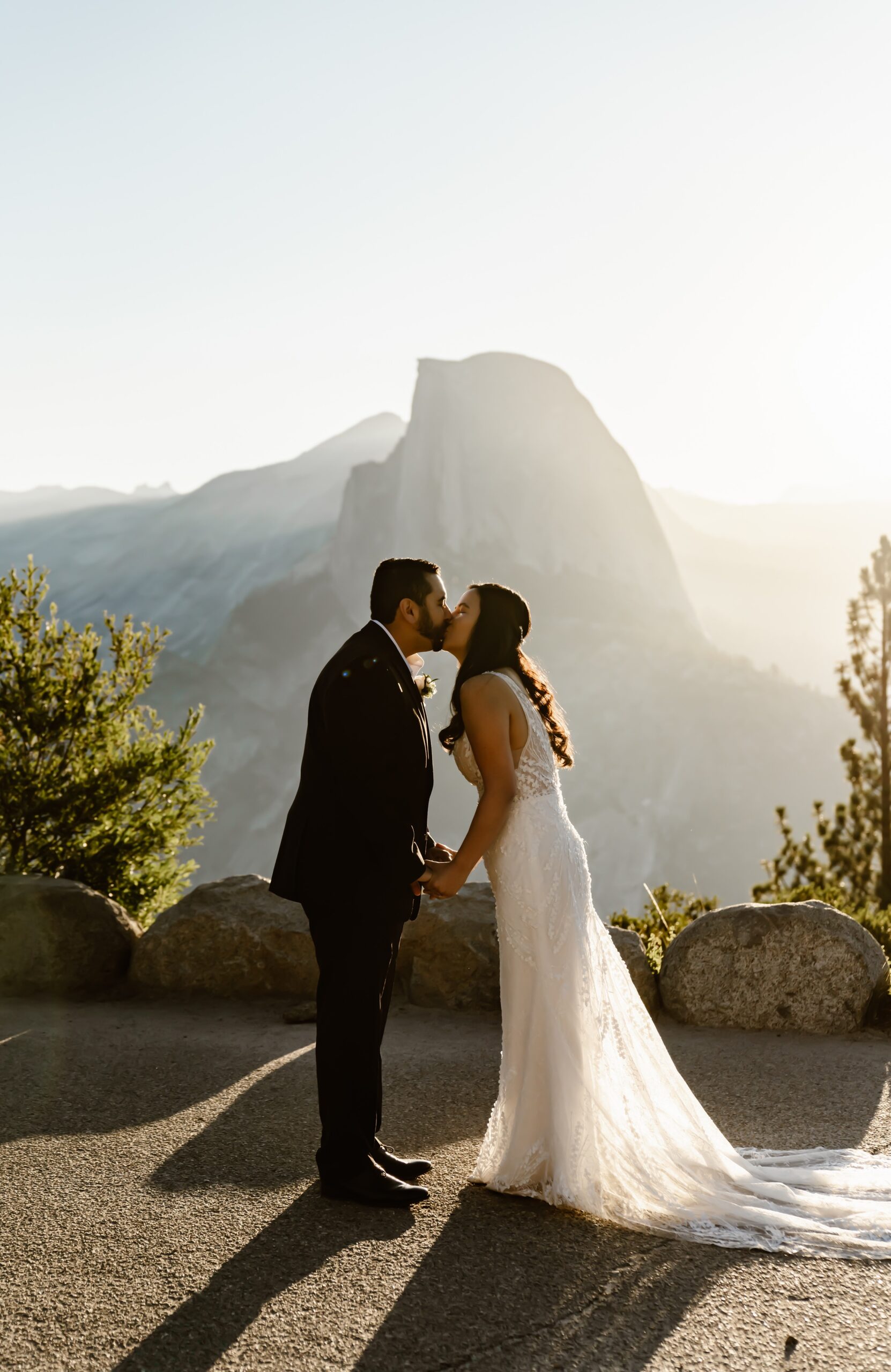 Bride and groom kiss during Yosemite wedding ceremony