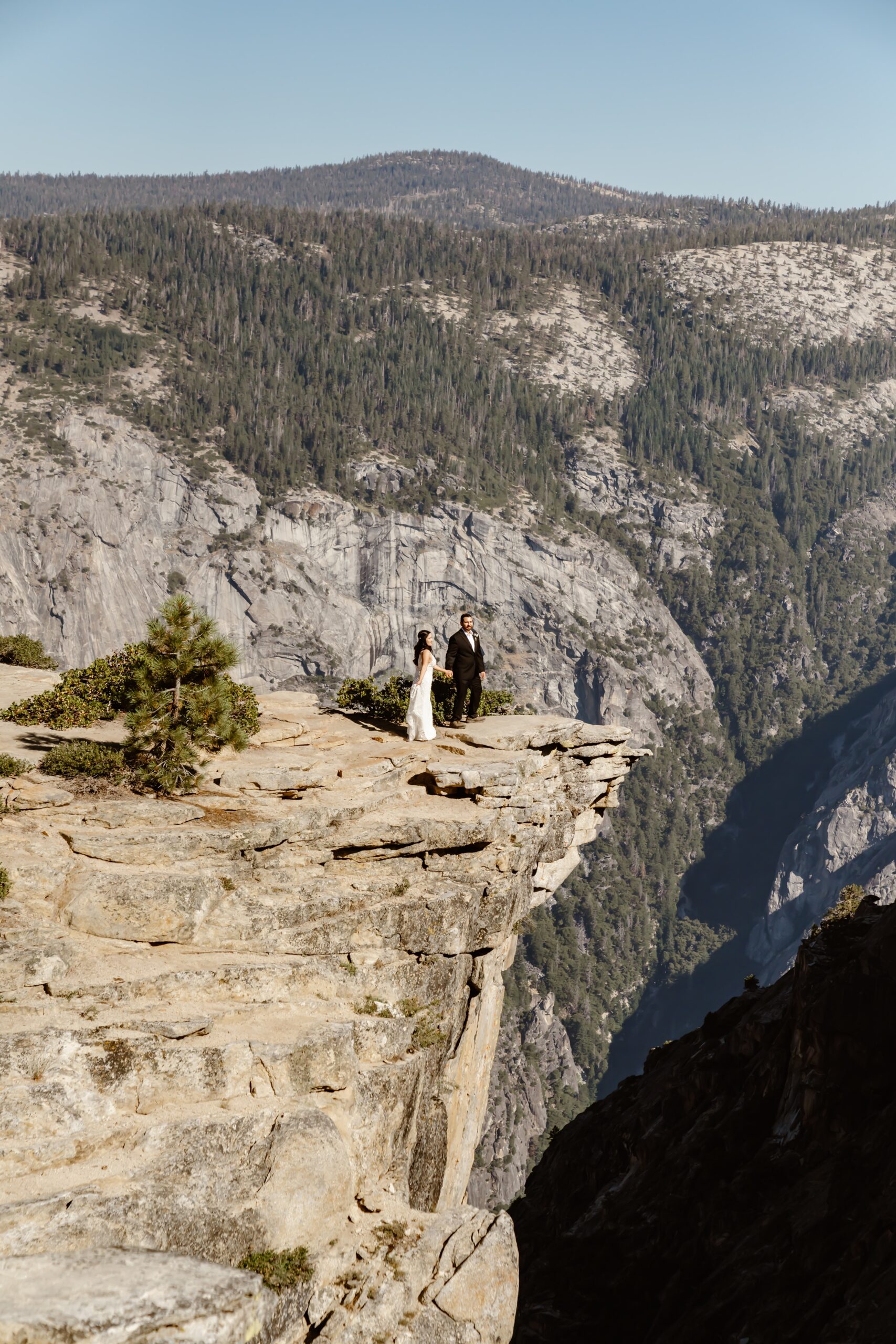 Bride and groom at Taft Point lookout