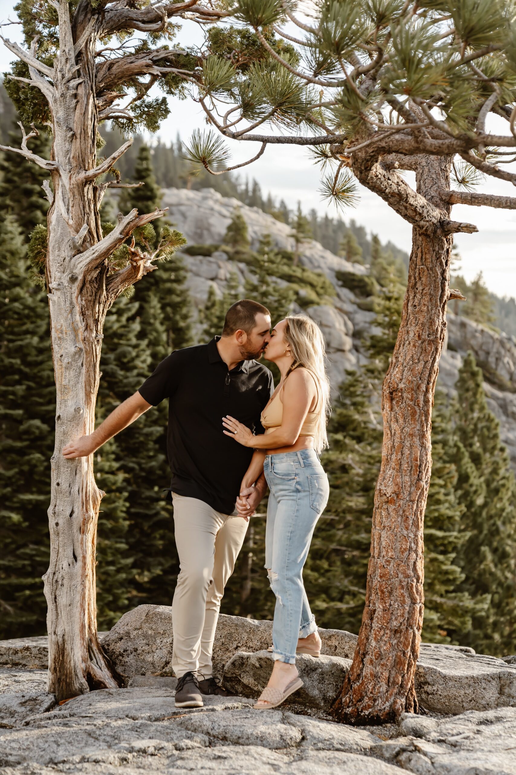 Couple kisses at Lake Tahoe engagement session