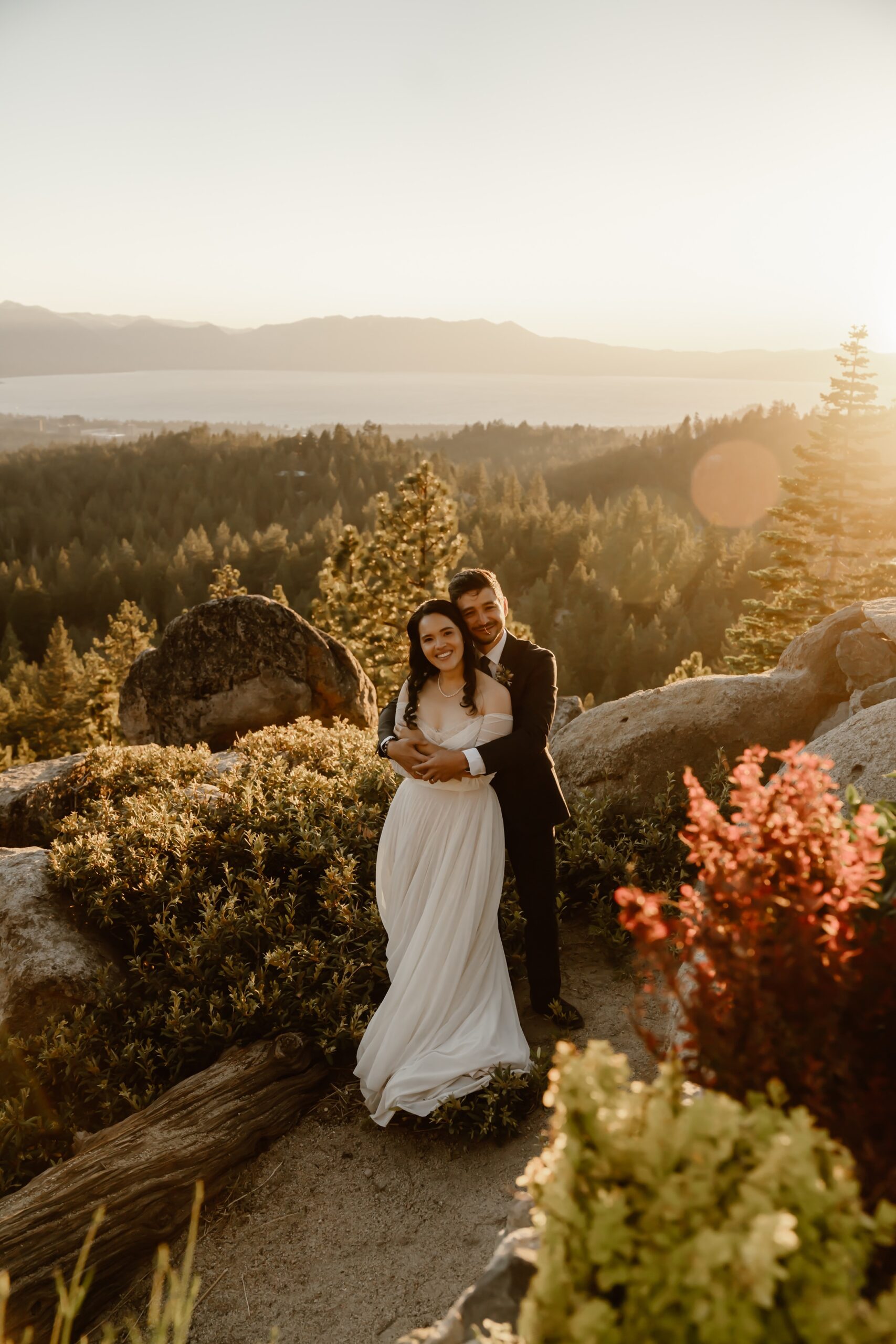Bride and groom pose for sunset photos at Tahoe Blue Estate wedding