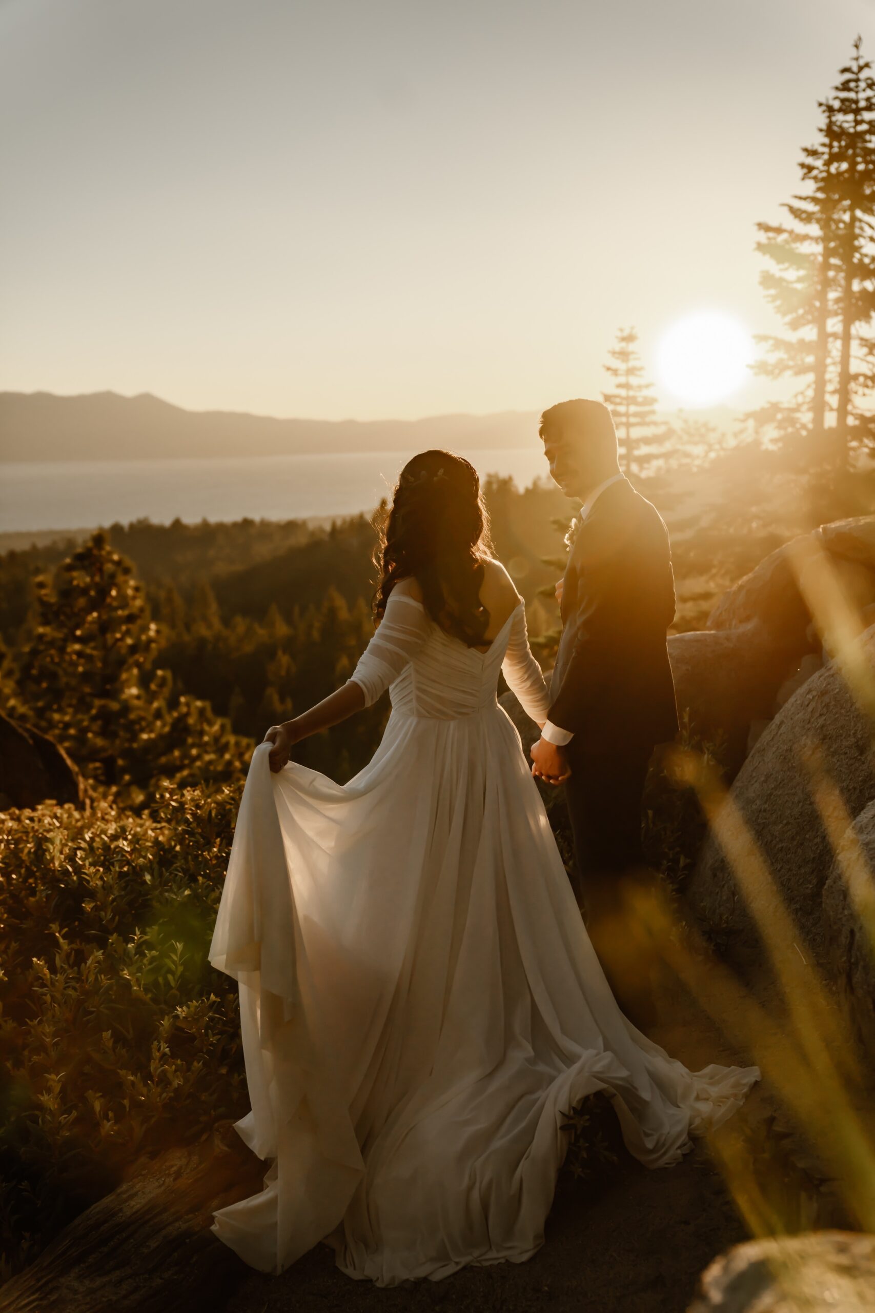 Couple explores Tahoe Blue Estate at sunset