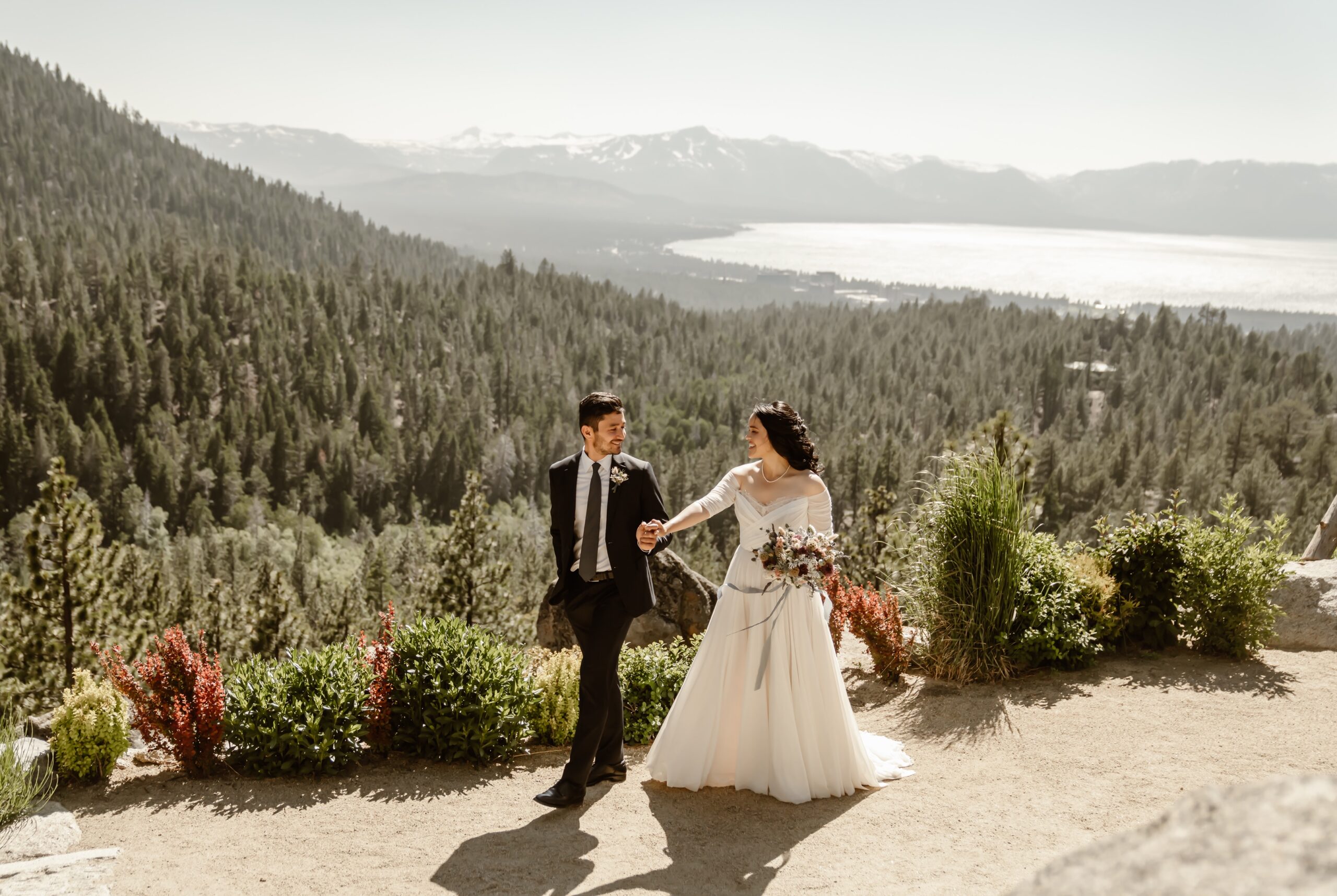 Bride and groom hold hands at Tahoe Blue Estate