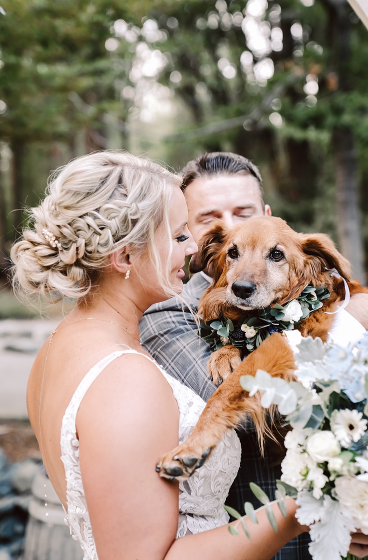 Bride and groom with their dog at The Roth Estate