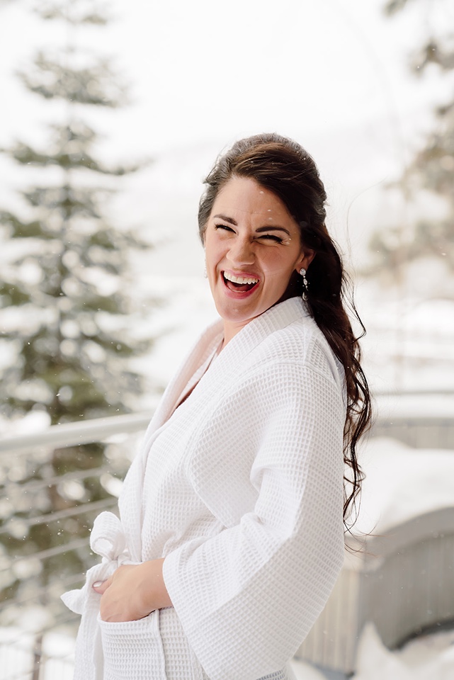 bride at an airbnb before her winter tahoe elopement