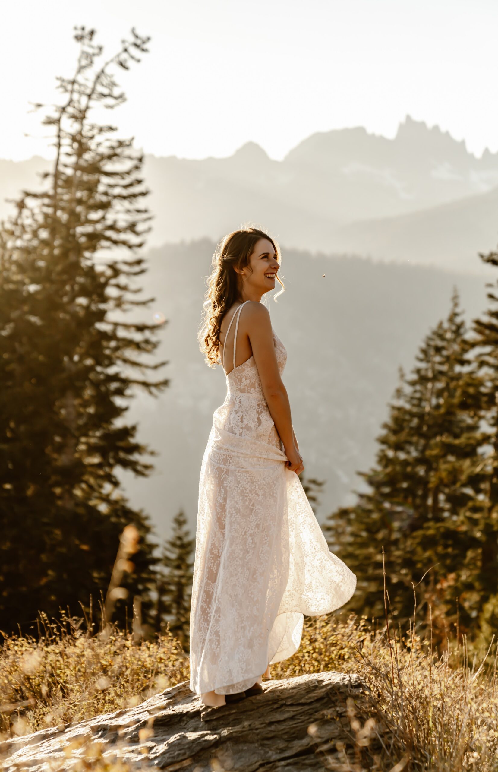 Bride smiles at the camera in Mammoth Lakes