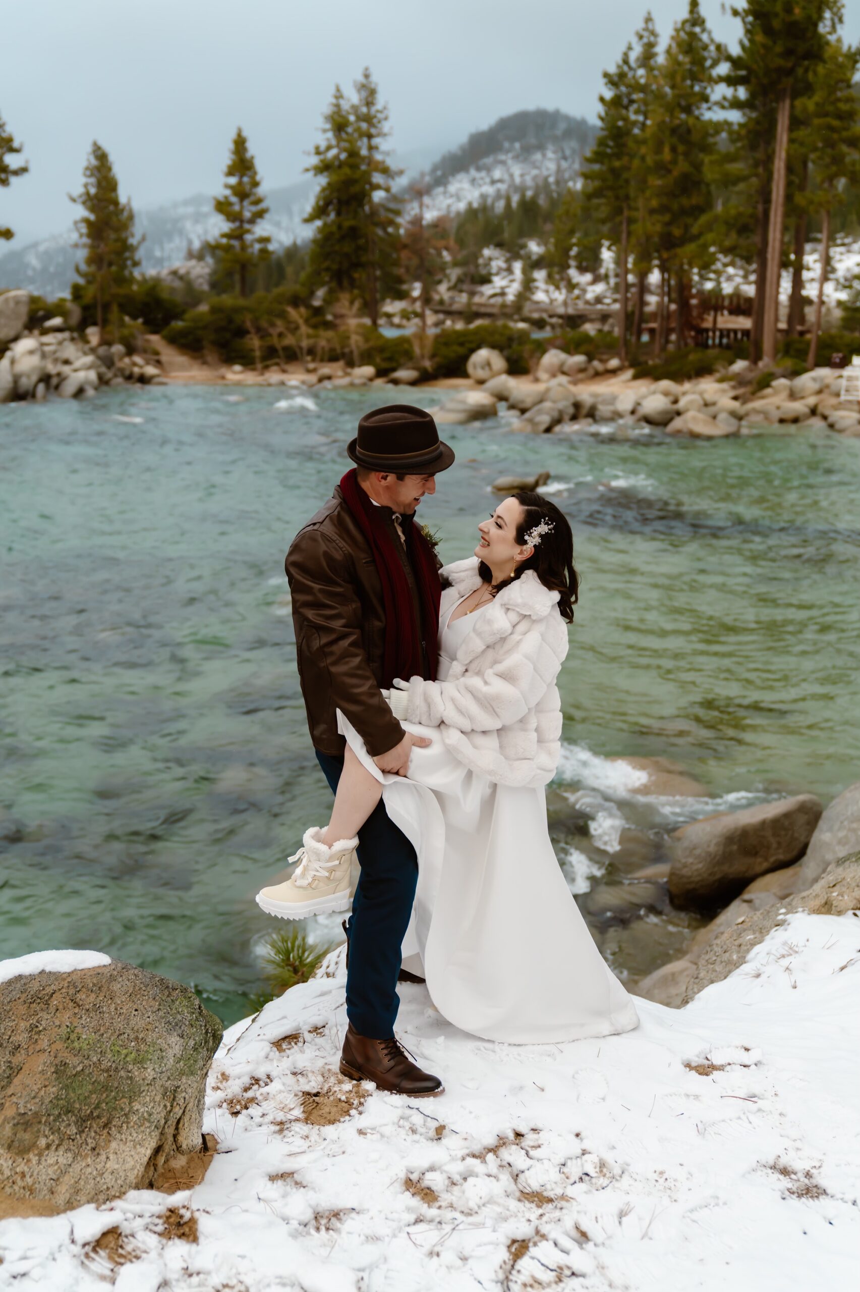 Couple smiles at each other at their Lake Tahoe elopement