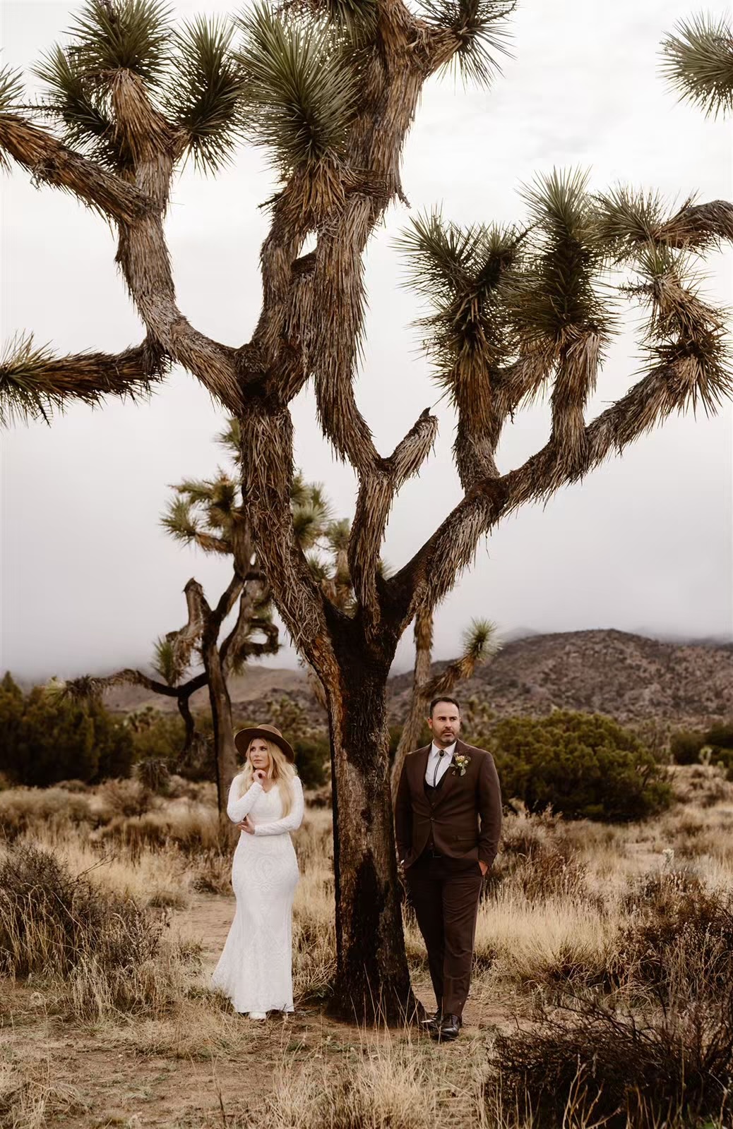 Bride and groom pose at their Joshua Tree elopement