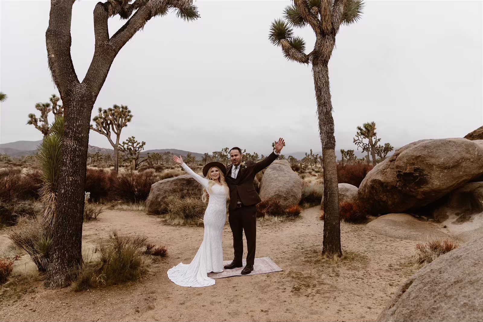 Bride and groom celebrate after Joshua Tree elopement