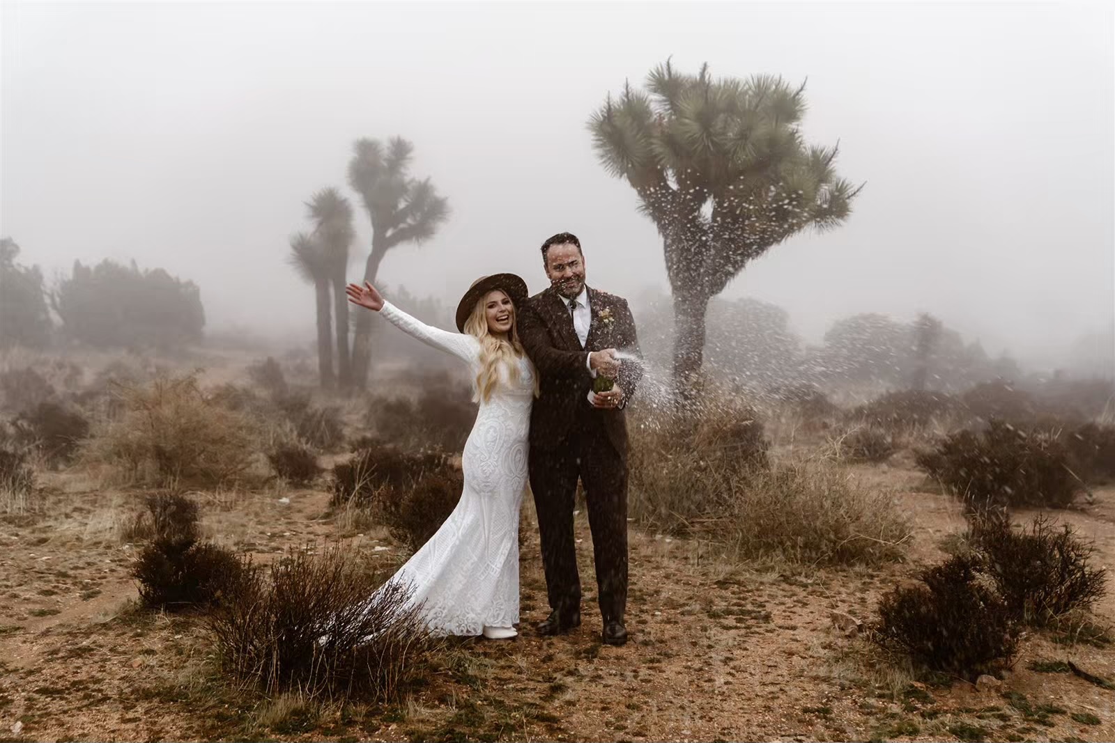 Bride and groom pose for Joshua Tree elopement photos