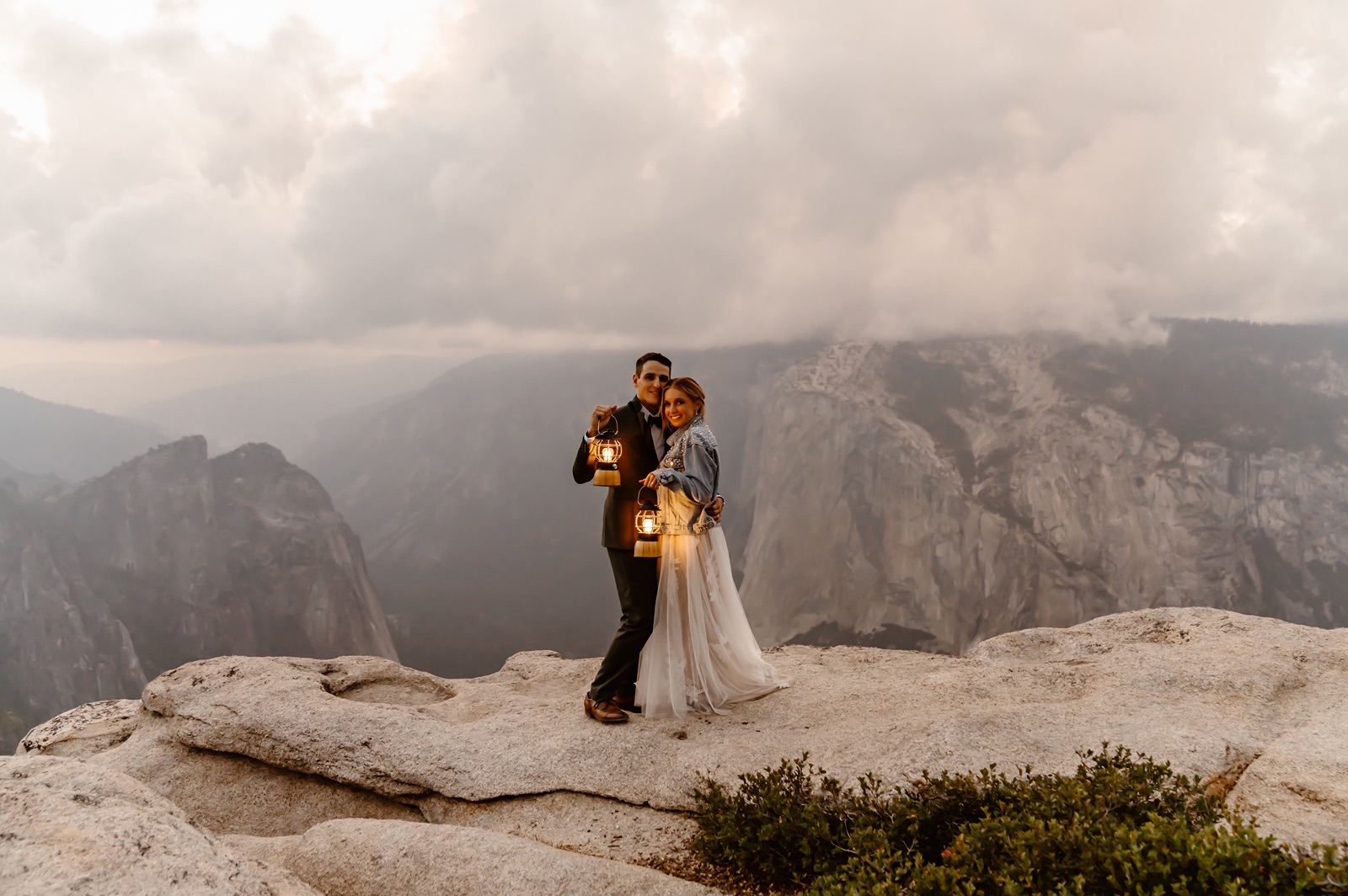 Bride and groom at Taft Point at sunset