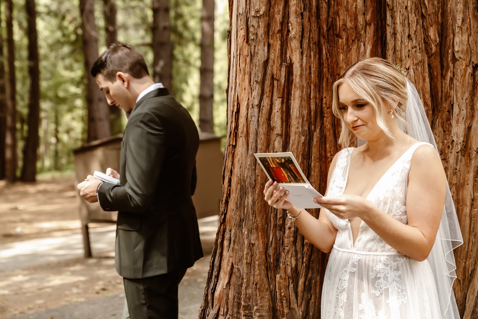 Bride and groom exchange letters and gifts at Yosemite National Park