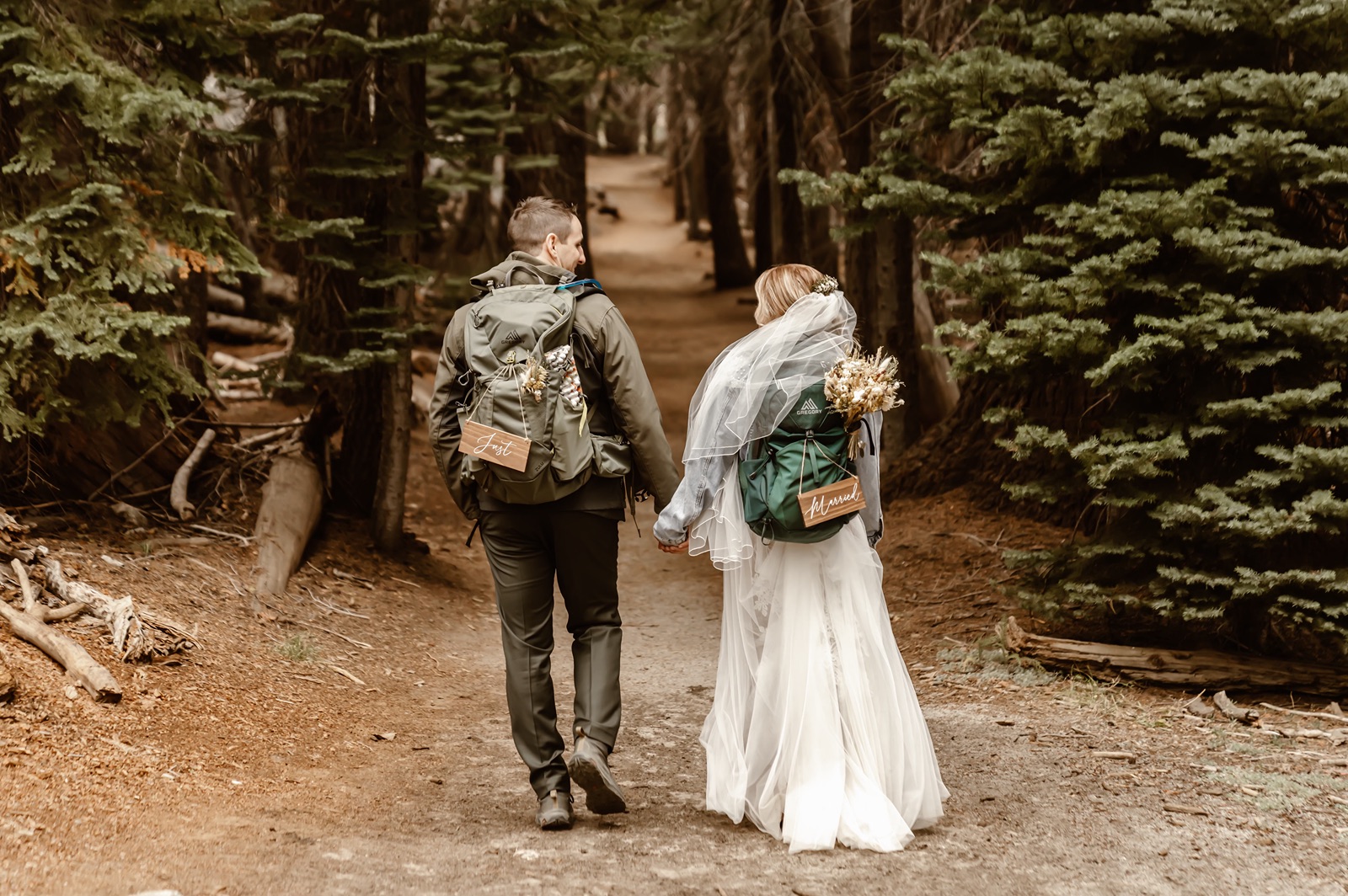 Bride and groom set out on elopement hike after their Yosemite wedding