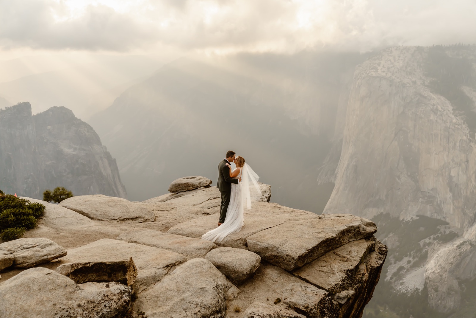 Bride and groom pose for Taft Point elopement photos