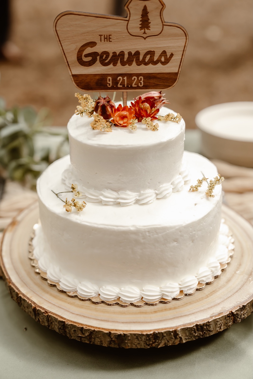 Two-tier wedding cake that the couple cut at their Cathedral Beach Yosemite wedding reception