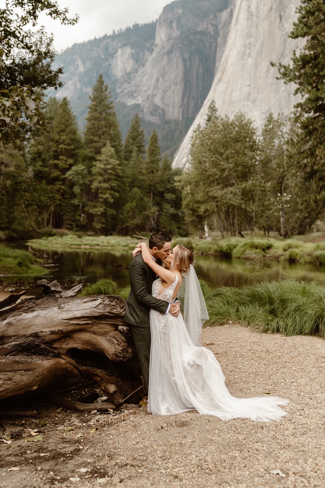 Bride and groom pose for portraits after their small Yosemite wedding