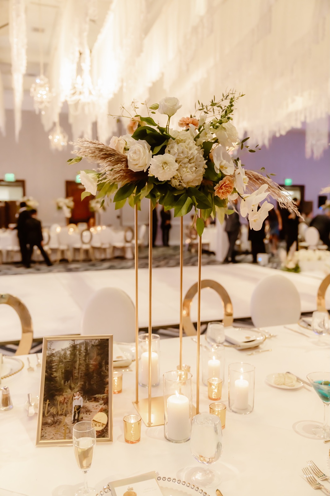 Elevated wedding centerpieces at the Everline Resort and Spa wedding reception