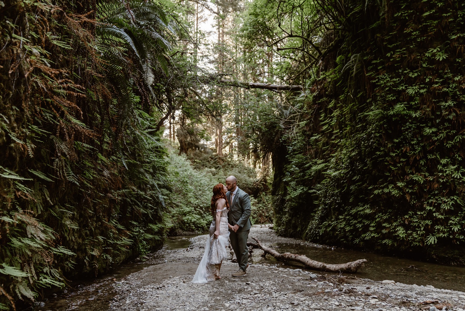 Bride and groom kiss during their Fern Canyon elopement