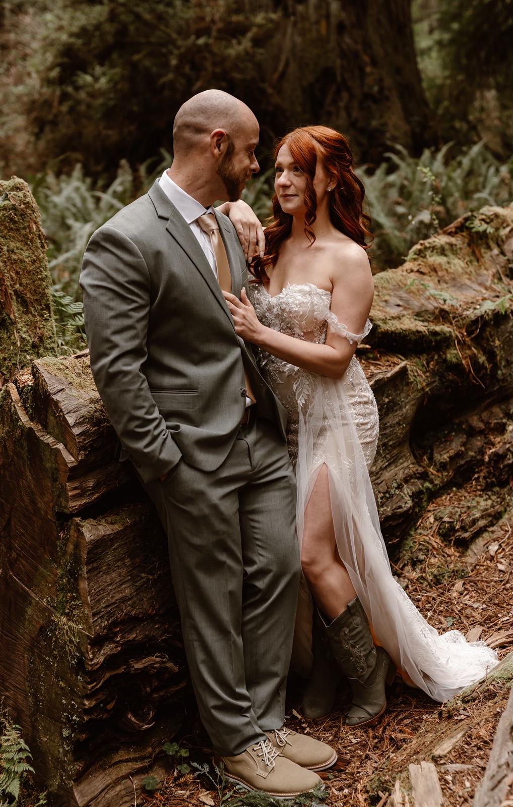 Bride and groom look lovingly at each other during their elopement in Fern Canyon