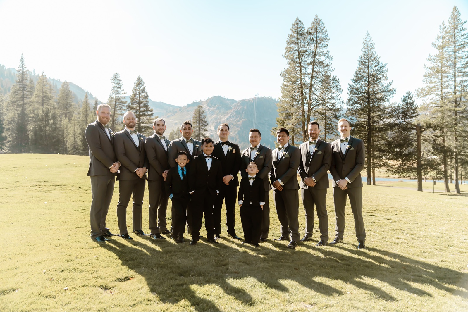 Groomsmen in matching suits pose at Everline Resort and Spa