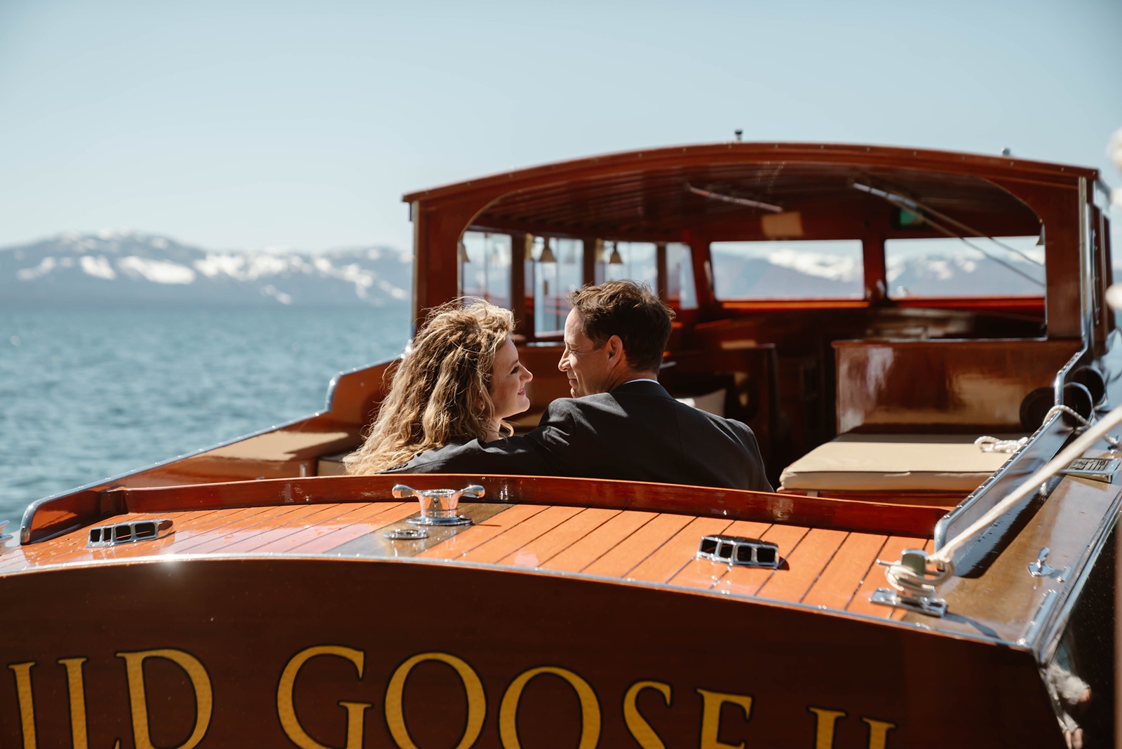Bride and groom set off via boat on Lake Tahoe