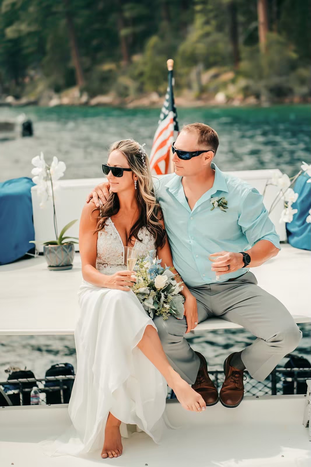 Couple enjoys toasts at the Lake Tahoe boat wedding