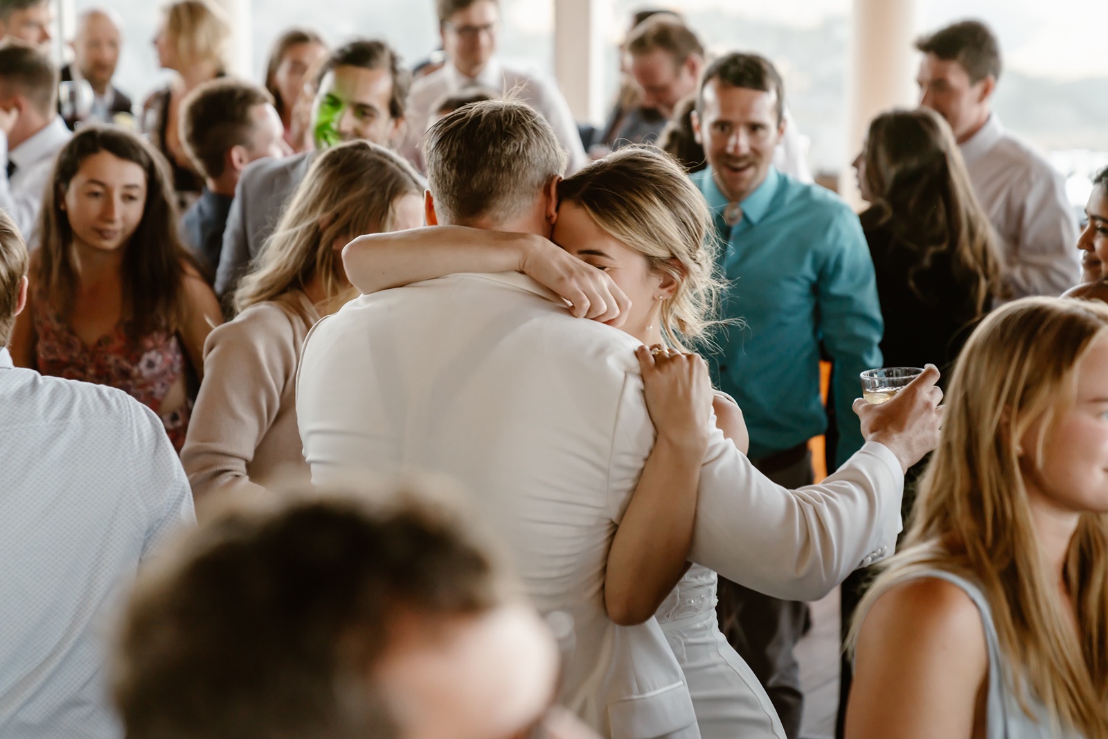 Newlywed bride and groom dance at their Palisades wedding reception