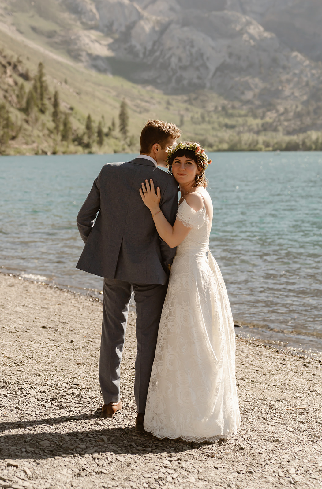 Bride and groom pose at Convict Lake