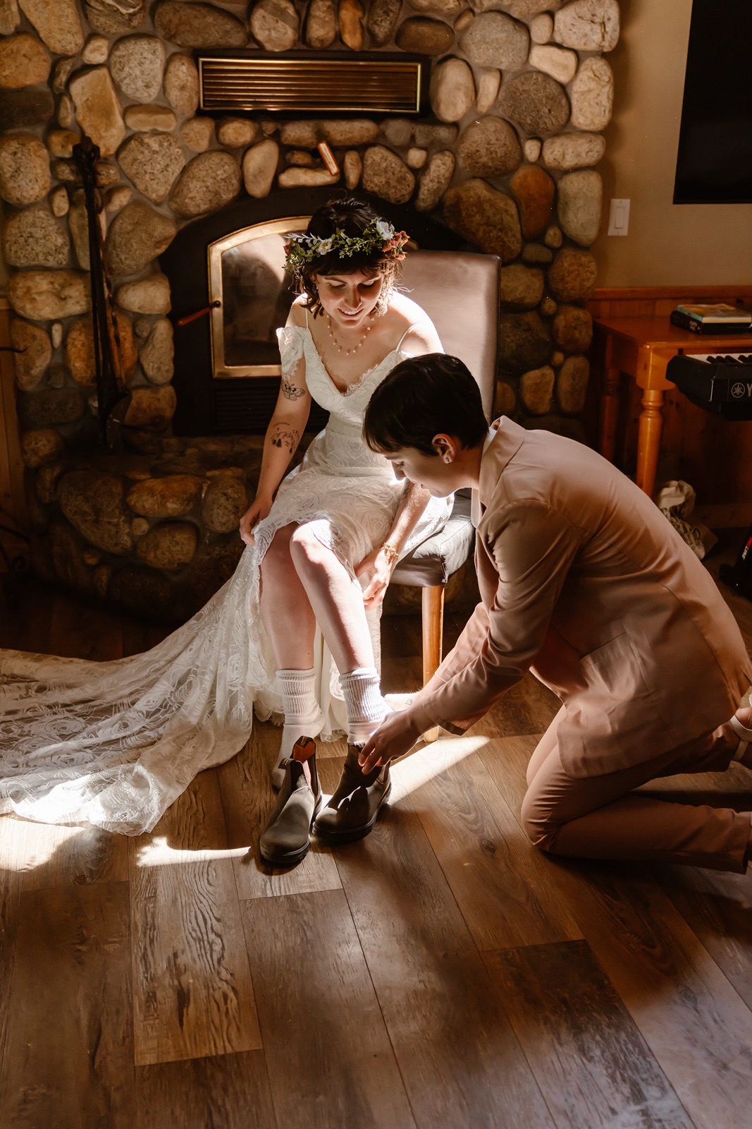 The bride was helped into her wedding shoes for the Convict Lake Resort wedding