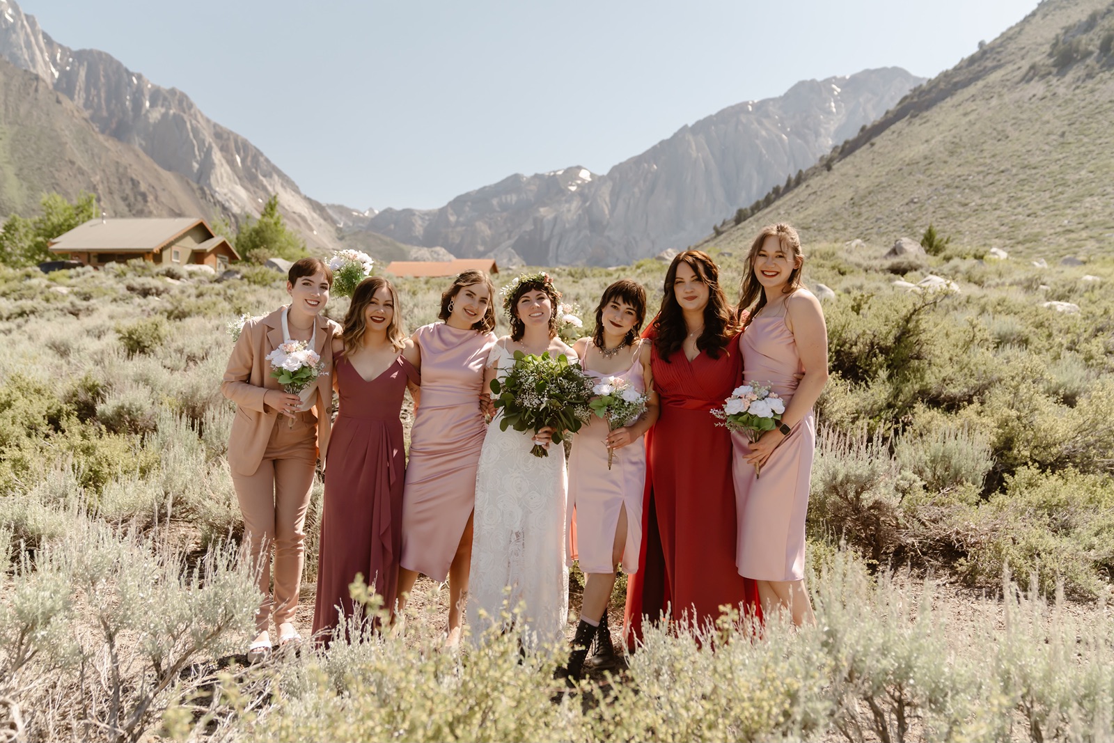 Bride and bridesmaids smile before the Convict Lake resort wedding