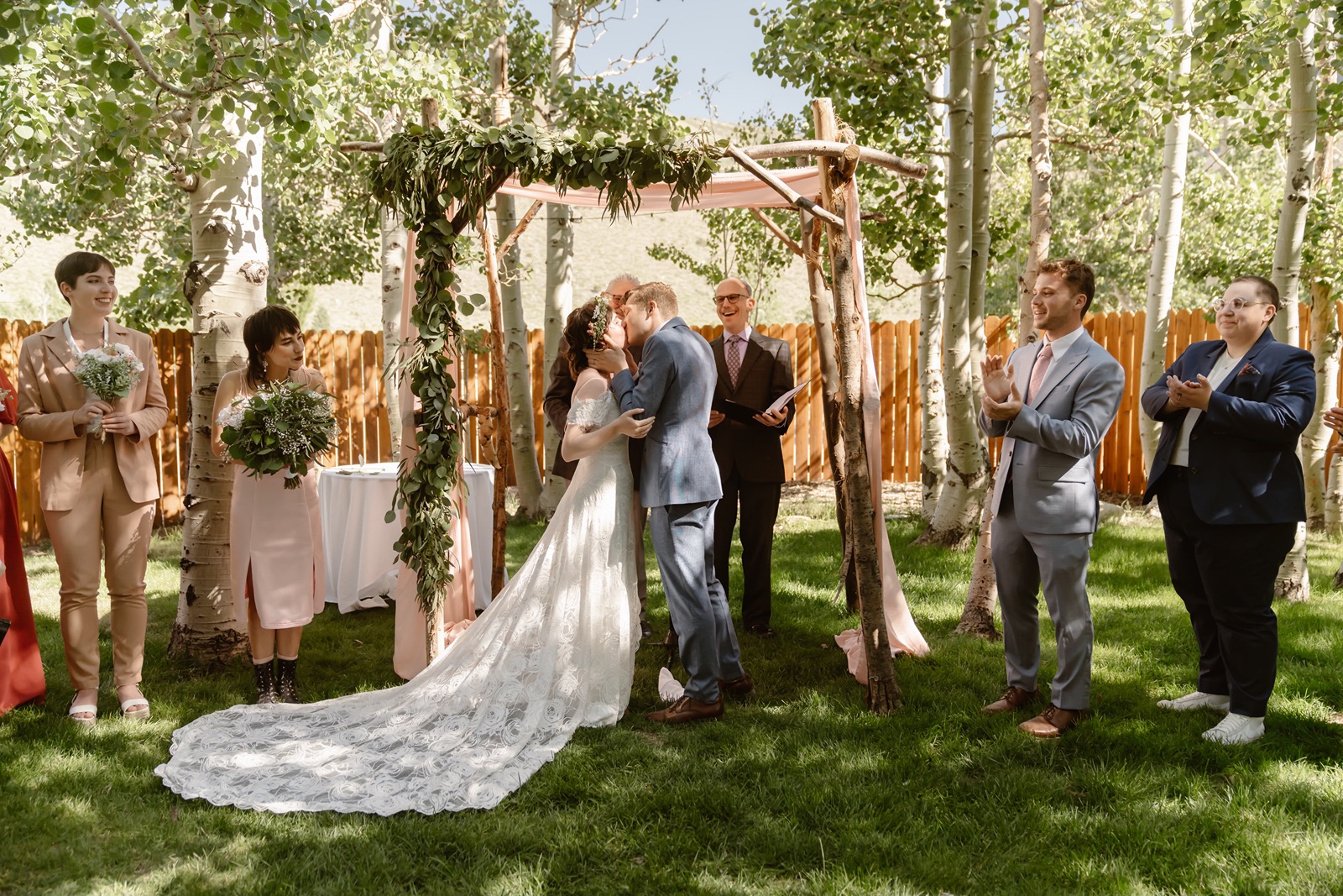 Couple kisses after saying their vows at the Convict Lake Resort wedding ceremony