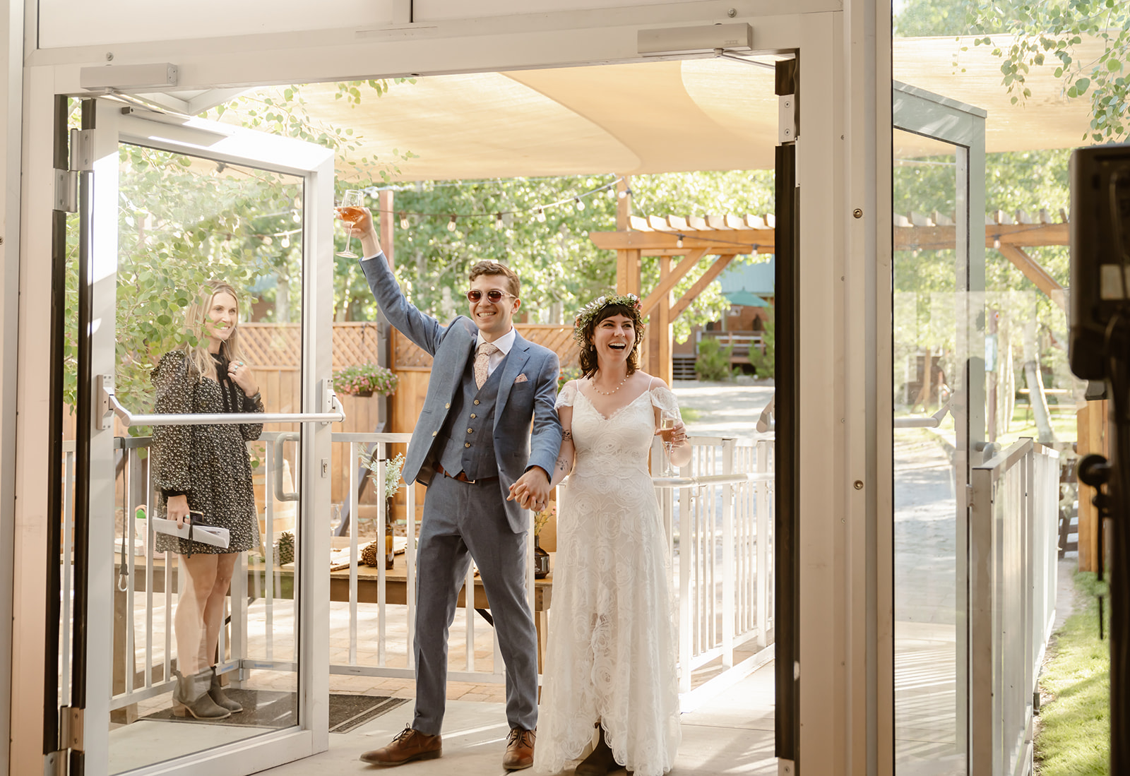 Bride and groom enter the wedding reception at Convict Lake Resort